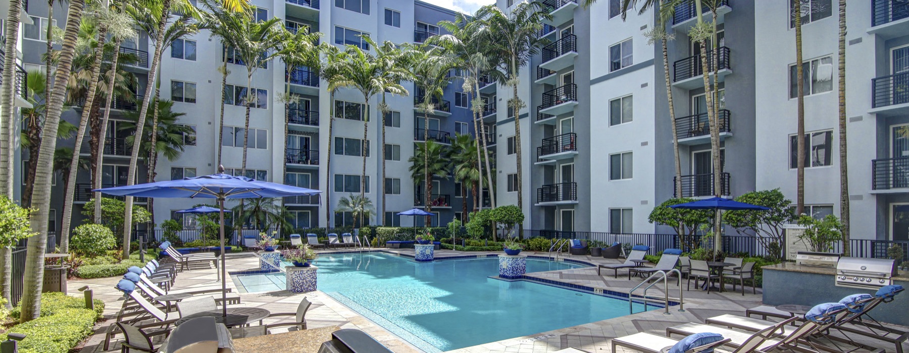 swimming pool with lounge chairs